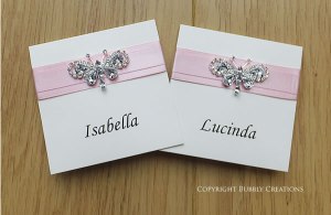 butterfly wedding place cards in pink