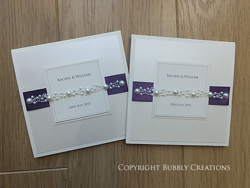 pearl wedding invitations in aubergine, dark purple in a pocket style.