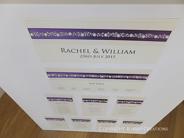 wedding table plan with pearl clusters in aubergine, dark purple. Luxury, handmade